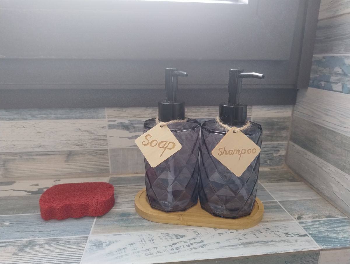 Soap and shampoo dispensers in the walk-in shower